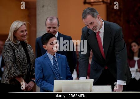 Madrid, Spain; 09/03/2020.- School contest What is a King to you? the audience with the winners of the XXXVIII edition of this contest, convened by the Spanish Institutional Foundation (FIES) at the Palacio del Pardo. King Felipe VI talks with each of the winners by communities about their work.Miguel Esteban of Madrid shows his work: a video in storytelling format, mixing real images and cartoons, tells the story and work performed by the sixth of “the Felipes” who have been kings in Spain Photo: Juan Carlos Rojas/Picture Alliance | usage worldwide Stock Photo