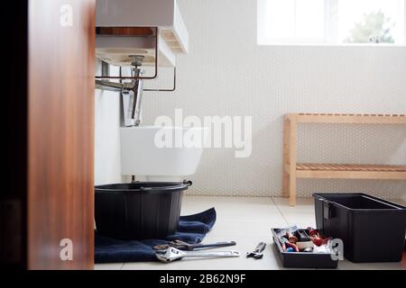 Plumbing Tools In Bathroom Ready To Repair Leaking Sink Stock Photo