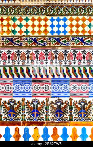 Colourful Spanish azulejo ceramic glazed tiles at Museo de Arte Andaluz Contemporaneo, a former 15th century monastery, Seville, Spain Stock Photo