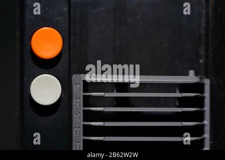 Old slide projector with slide frame photographed in the studio with flash light