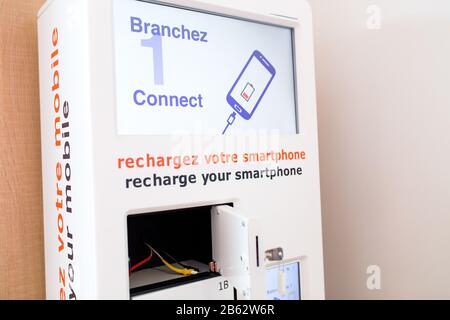 Free charging station for smart phones and other electronical gadget in airport. Stock Photo