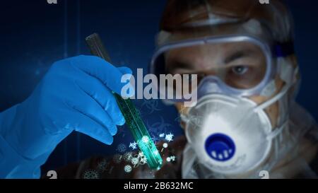 Scientist in mask and protection glasses with test-tube in glove hand. Concept of science, biology, health, medical, virus covid-19 research, coronavi Stock Photo