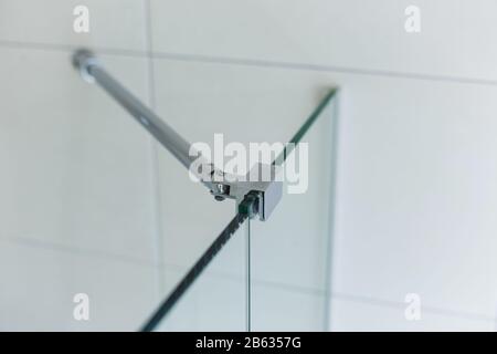 Clamp for Glass curtain for the bathroom Stock Photo