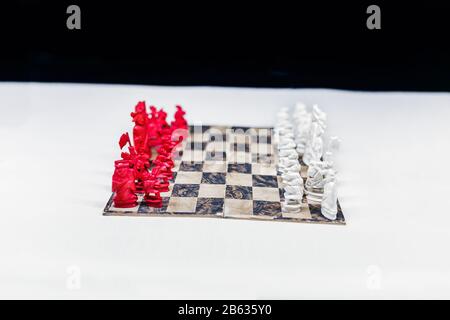 old antique chess on white table Stock Photo