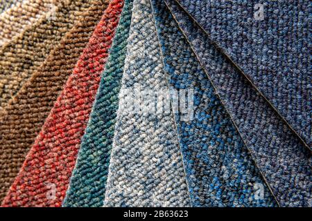 multicolored carpet samples in detail, background and wallpaper Stock Photo
