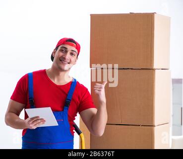 The contractor worker moving boxes during office move Stock Photo