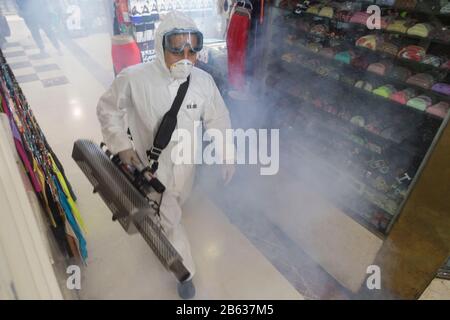 Tehran, Iran. 6th Mar, 2020. Firefighter teams with protective suits disinfect the Tajrish Bazaar shopping center as a precaution to the coronavirus (Covid-19) in Tehran. Iranian officials canceled Friday prayer for the second week due to concerns over the spread of coronavirus and COVID-19. According to the last report by the Ministry of Health, there are 4,747 COVID-19 cases in Iran. 147 people have died so far. A Health Ministry spokesman warned authorities could use unspecified 'force' to halt travel between major cities. Credit: Rouzbeh Fouladi/ZUMA Wire/Alamy Live News Stock Photo