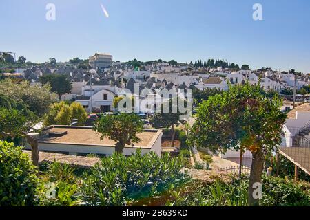 Panoramic View Of Alberobello Ancient City Ancient City With Typical Trulli Houses Apulia Italy. Stock Photo