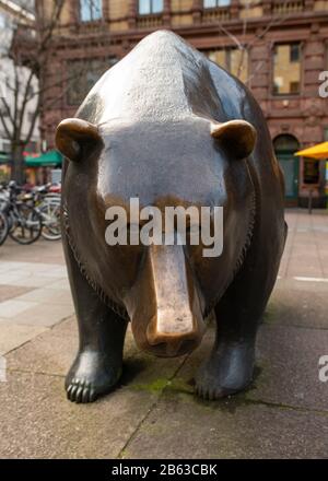Bear statue outside Frankfurt stock exchange facing a bull, representing a stock market bear market, Frankfurt, Germany Stock Photo
