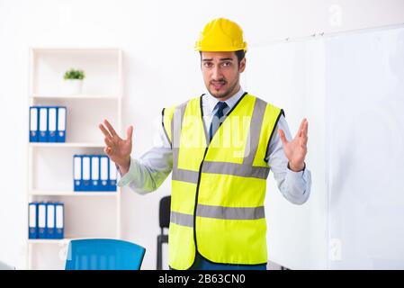 Young architect in presentation concept Stock Photo