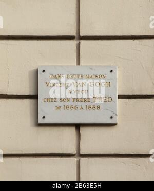 Commemorative tablet on the house where Vincent van Gogh lived together with his brother Théo van Gogh at Rue Lepic in Montmartre in Paris, France. Text on the plaque means: In this house Vincent van Gogh lived with his brother Théo from 1886 to 1888. Vincent van Gogh lived here from June 1886 to February 1888. Stock Photo