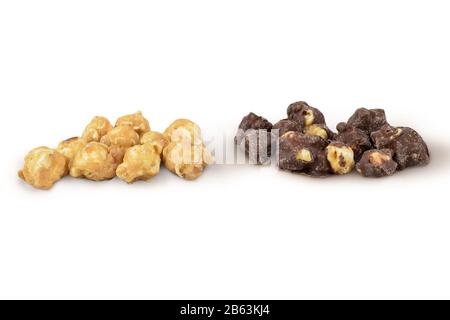 Groups of chocolate covered and caramel popcorn sitting merrily on a white background. Contains clipping path. Stock Photo