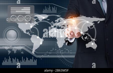 Businessman touching world map and graph on screen with his finger, Elements of this image furnished by NASA Stock Photo