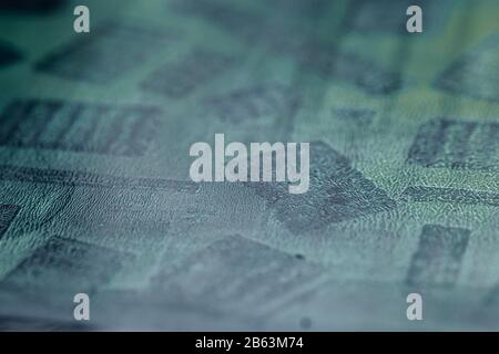 Surface of printing plate with wet paint - selective focus on blurry background Stock Photo