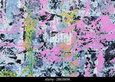 Colourful paint splashes on white paper background Stock Photo