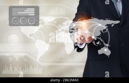 Businessman touching world map and graph on screen with his finger, Elements of this image furnished by NASA Stock Photo