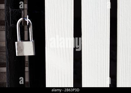 Padlock on a gate closeup. Stock Photo