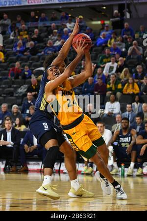 March 9, 2020: North Dakota State Bison guard Tyson Ward (24) drives to the basket during the Summit League semi-final basketball game between the Oral Roberts Golden Eagles and the North Dakota State Bison at the Denny Sanford Premier Center, Sioux Falls, SD. NDSU defeated ORU 75-69. Photo by Russell Hons/CSM Stock Photo