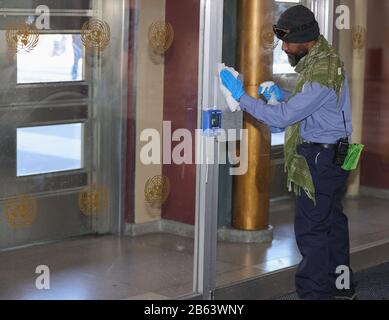 United Nations, New York, USA, March 09, 2020 - UN Worker from ABM Industries Keith Croney Sterilizing Every Suffice witch are Touched by Visitors and Diplomats to Prevent the Corona Virus (COVID-19) to enter the UN Headquarters in New York. The Cleaning Workers Clean Every Meeting Room Before Any Meeting Takes Place.Photo: Luiz Rampelotto/EuropaNewswire PHOTO CREDIT MANDATORY. | usage worldwide Stock Photo