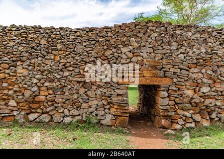 Thimlich Ohinga, stone-built ruins of historic 15th century Iron Age village enclosure, Kenya. Irregular shaped stones. No mortar. Stock Photo