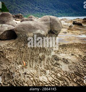 The harsh rocky coastline at Artillery Rock along the Great Ocean Road, Victoria, Australia. Stock Photo