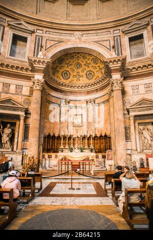 Rome. Italy - March 21, 2017: Altar Inside the Pantheon in Rome. Interior of Pantheon with Tourists. Stock Photo