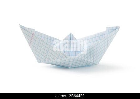 A paper boat from a school notebook sheet isolated on white Stock Photo