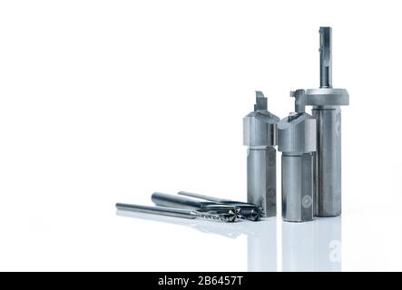 Special tools isolated on white background. Made to order special tools. Coated step drill and reamer detail. HSS cemented carbide. Carbide cutting Stock Photo