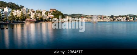 Oriental Bay and Wellington city, New Zealand on a calm Summer's morning. Stock Photo