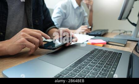 Collaborative work Software engineers website developer technologies or programmer working coding on startup ai application project on screen with par Stock Photo
