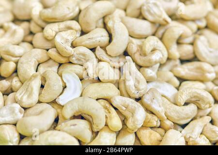 Background and texture of peeled cashew nuts. Close up. Stock Photo