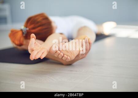 Yoga girl. The concept of an active lifestyle of sports life sports fitness yoga pilates meditation relaxation relaxation gym. Stock Photo