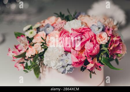 Colorful decoration for wedding celebration. Beauty bridal interior. Bouquet and flowers in hall Stock Photo