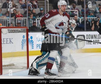 Colorado Avalanche right wing Valeri Nichushkin, center, puts a shot on ...