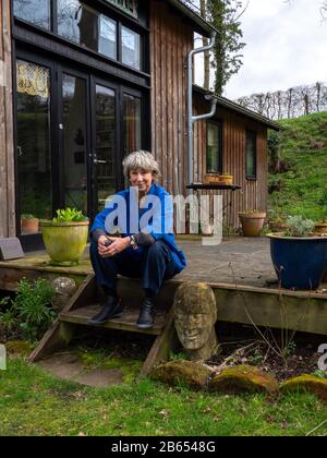 Author Julia Blackburn in the garden of her home in Suffolk Stock Photo ...