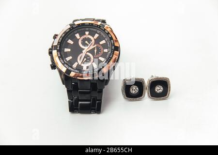 cufflinks and wristwatch isolated on white Stock Photo