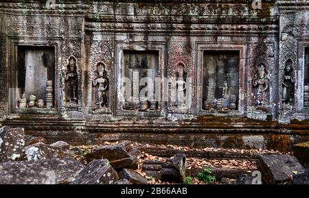 Cambodia-Angkor Ta ProhmSandstone sculpture of Apsara Devata. An Apsara or Apsarasa is a female spirit of the clouds and waters in Hindu and Buddhist mythology. Deva is the Hindu term for deity, devatas are a kind of smaller more focused devas Stock Photo