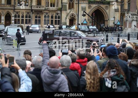 Queen Elizabeth II, leaves the service. The Commonwealth Service at Westminster Abbey today, attended by Queen Elizabeth II, Prince Charles The Prince of Wales, Camilla The Duchess of Cornwall, Prince William The Duke of Cambridge, Catherine The Duchess of Cambridge, Prince Harry The Duke of Sussex, Meghan Markle The Duchess of Sussex, Prince Edward The Earl of Wessex, Sophie The Countess of Wessex, along with heads of government and representatives of the countries of the Commonwealth. Commonwealth Service, Westminster Abbey, London, March 9, 2020. Stock Photo