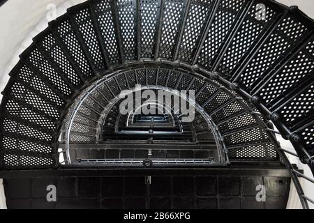 Looking up the interior stairwell of the Bodie Island Lighthouse on the Outer Banks of North Carolina. Stock Photo