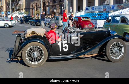 Bari, Italy - April 28, 2019: Participant in his racing car at the competition in the historic reenactment of the Grand Prix in Bari, held in Bari in Stock Photo