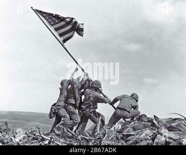 BATTLE OF IWO JIMA February-March 1945. 'Raising the Flag on Iwo Jima' 23 February 1945 by Associated Press photographer Joe Rosenthal. Stock Photo