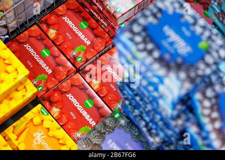Umea, Norrland Sweden - February 23, 2020: frozen berries in cartons at grocery store Stock Photo