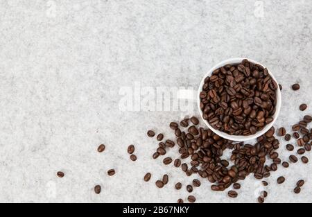 Good coffee beans in a caffe mug Stock Photo