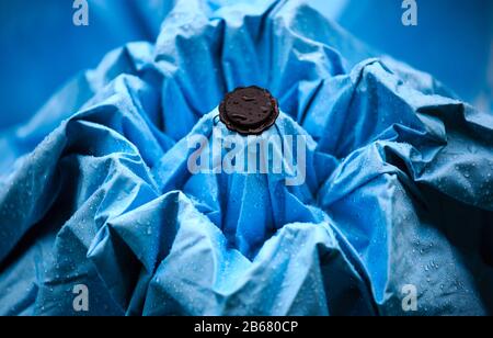 Rain drops on a blue umbrella , Raindrops on an umbrella Stock Photo