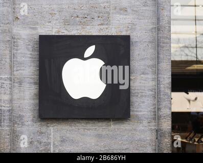 Hannover, Germany - March 2, 2020: Apple logo on facade of local apple store. Stock Photo