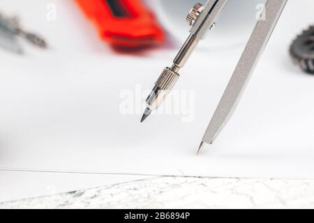 Engineering supplies and blueprints on workplace close up Stock Photo