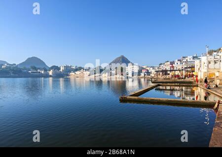 Panoramic view of the holy lake in Pushkar, India. Pushkar is a town in the Ajmer district in the state of Rajasthan. Stock Photo