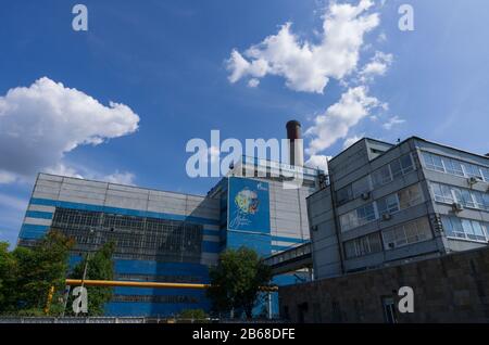 Saint Petersburg, Russia-July 21, 2019: The main administration building 'Southern thermal power plant' with the name of the station in Russian on a c Stock Photo