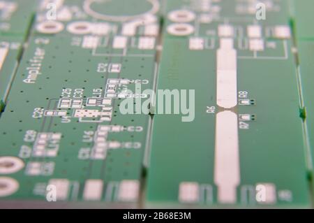 V-groove v-cut printed circuit boards PCB panel technological separation for mass production Stock Photo