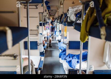 09 SEPTEMBER 2017, UFA, BASHKORTOSTAN: Interior of a typical russian long-distance RZD train with beds for sleeping Stock Photo